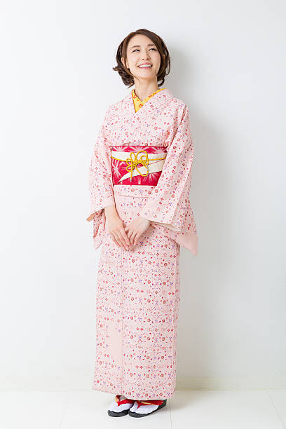 istock Woman wearing a kimono 620389216