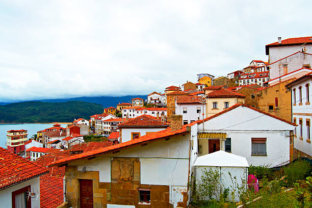 Houses near the sea in Lastres, community of Asturias, Spain Houses near the sea in Lastres, community of Asturias, Spain ballast water stock pictures, royalty-free photos & images