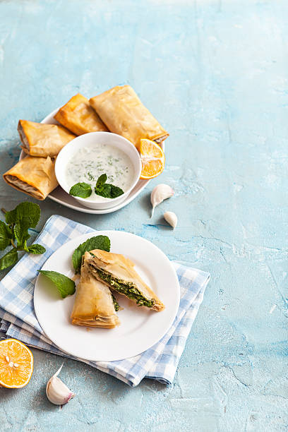 broccoli and spinach Spanakopita broccoli and spinach Spanakopita spanakopita stock pictures, royalty-free photos & images