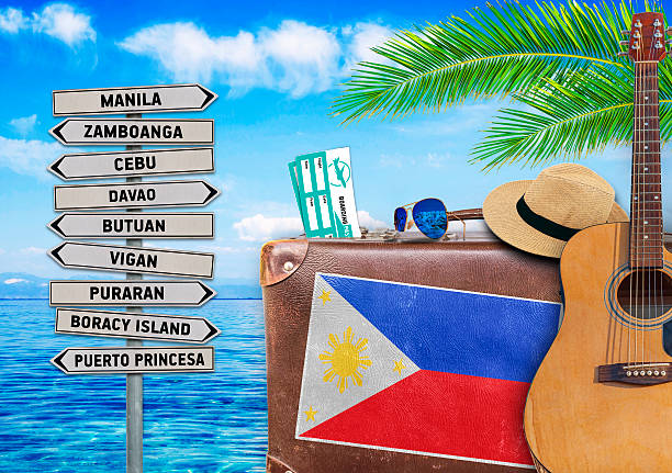 Concept of summer traveling with old suitcase and Philippines town Concept of summer traveling with old suitcase and Philippines town sign cebu province stock pictures, royalty-free photos & images