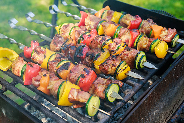 istock Appetizing fresh meat shish kebab prepared grill wood 620393372