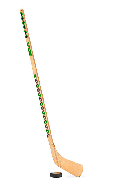 istock Ice hockey stick and puck 620395180