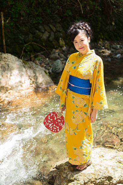 istock Japanese woman wearing yukata 620401510