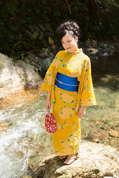 istock Japanese woman wearing yukata 620401576