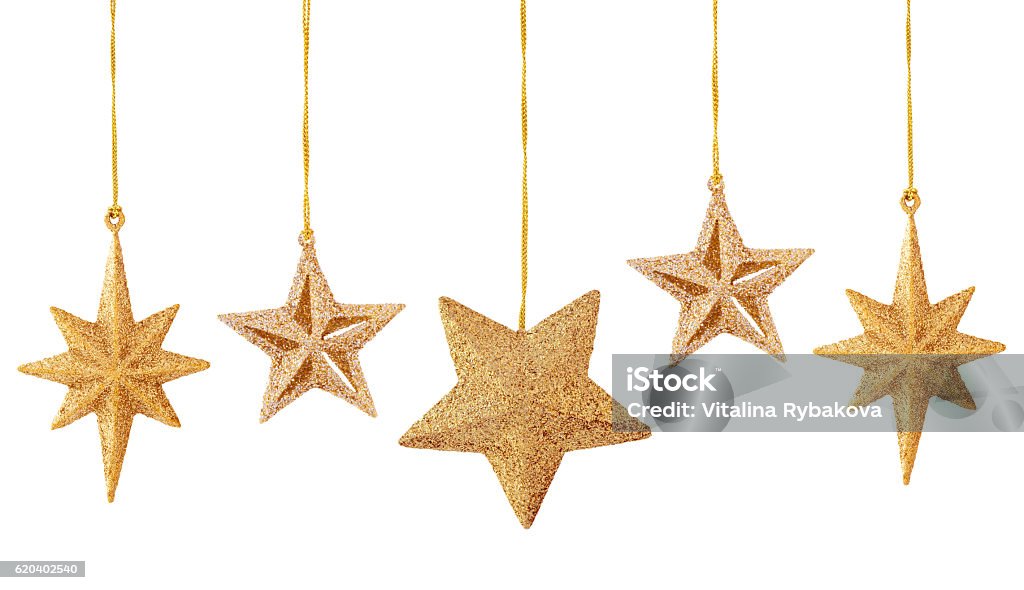 Christmas decoration on white. Set of gold stars isolated on white background. Christmas Decoration Stock Photo