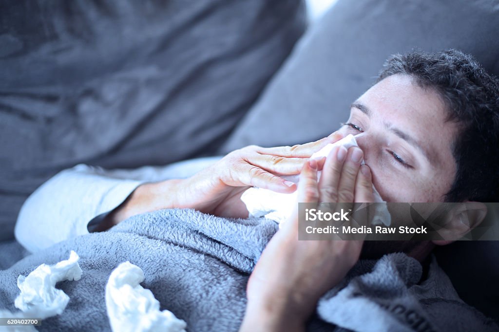 sick man , flu, cold and he has fever Cold And Flu Stock Photo