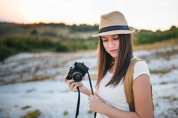 istock Woman photographer 620403212