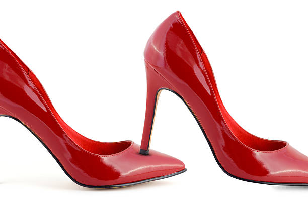 istock Woman red shoes 620403754