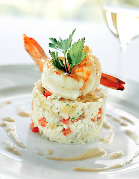 seafood risotto y10-2seasonal risotto dish lobster seafood photos stock pictures, royalty-free photos & images