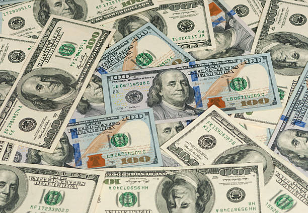 istock old and new hundred dollar bills in a pile 620409536