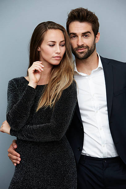 istock Stunning man and woman in smart clothes 620409862