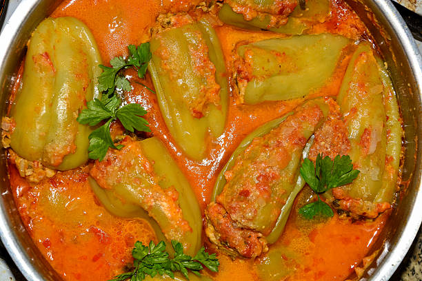 Close-up of stuffed pepper with tomato sauce