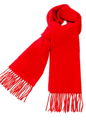 Warm red scarf out of pure cashmere wool  isolated on white background.