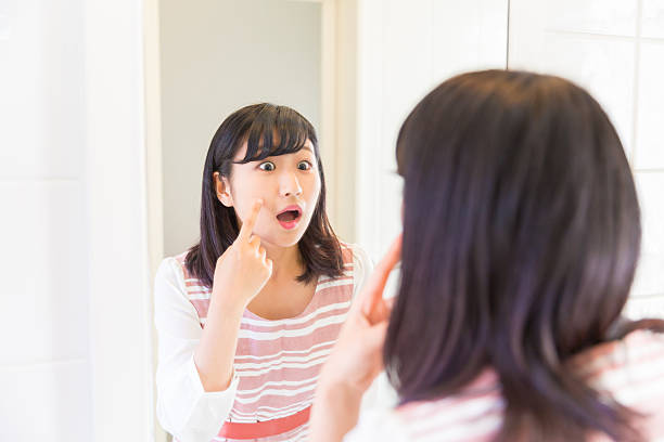 istock Japanese woman in front of mirror 620412344