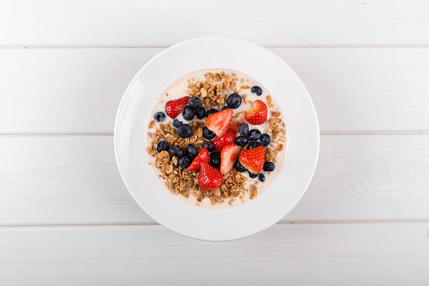 istock top view of cereal muesli breakfast with fresh berries 620412500