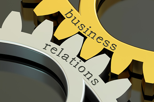 Business Relations concept on the gearwheels, 3D rendering