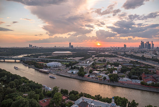 istock Panoramic view of sunset above Moscow city and cloud reflections 620696714
