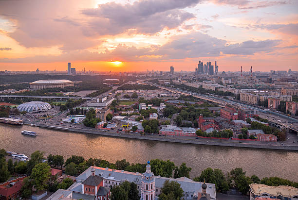 istock Panoramic view of sunset above Moscow city and cloud reflections 620696774