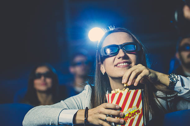 istock Girl watching a movie 620696834