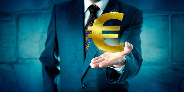 istock Currency Trader Showing A Golden Euro Symbol 620698638