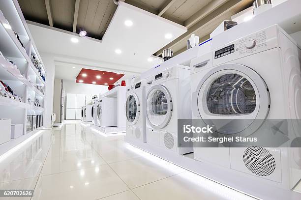 Home Appliance In The Store Showroom Stock Photo - Download Image Now - Store, Appliance, Washing Machine