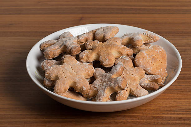 istock Plate with handmade cookies on a wooden table. 620703556