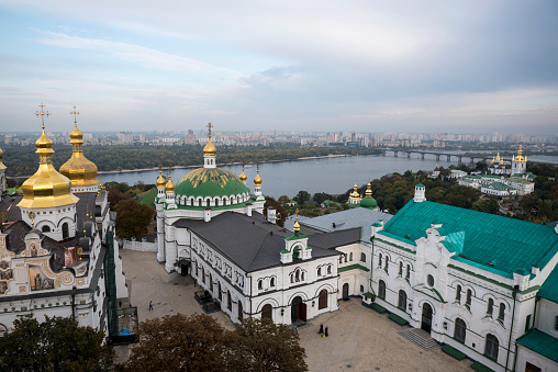 View of the Kiev Pechersk Lavra and Dnieper River from the Great Lavra Belltower in Kiev, Ukraine. A monastic center and UNESCO World Heritage Site, the Kiev Pechersk Lavra is a landmark in the city..