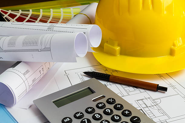istock An office desk with the project papers 620707704