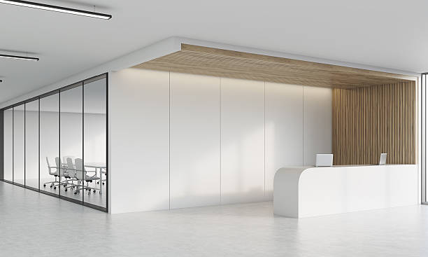 istock Side view of reception desk and meeting room in corridor 620707954