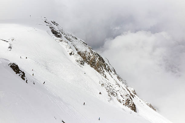 istock high mountain ski slope, skier remote 620708048