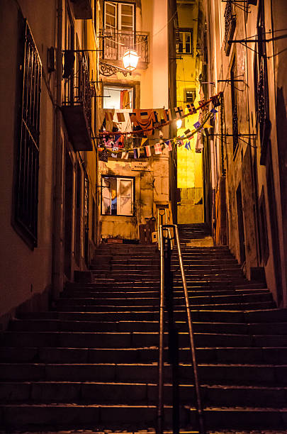 Escadinhas (stairs) in Lisbon, Portugal during a night of autumn, seen from the bottom.