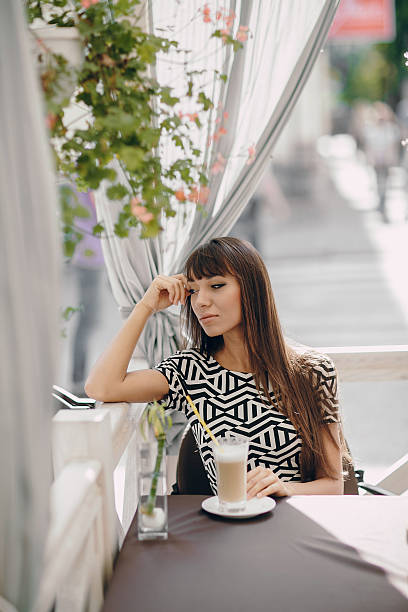 istock Girl in cafe 620715370