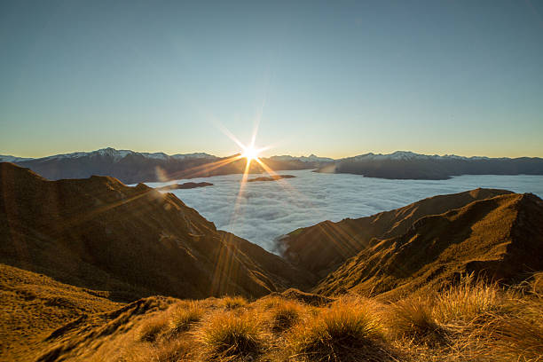 istock Sunset over the clouds, mountain landscape 620717784