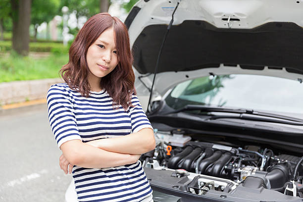 istock Japanese woman looking at bonnet 620718378