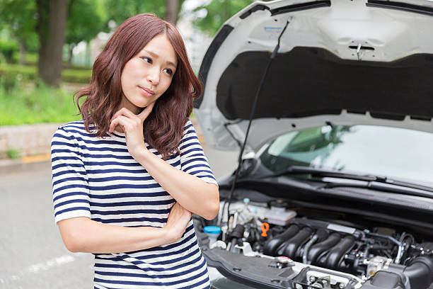 istock Japanese woman looking at bonnet 620718386