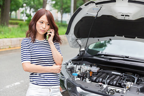 istock Japanese woman looking at bonnet 620718490