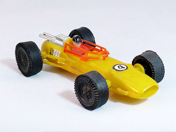 istock Yellow race car toy 620721572