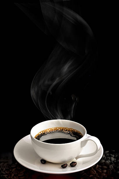 Cup of coffee with coffee beans