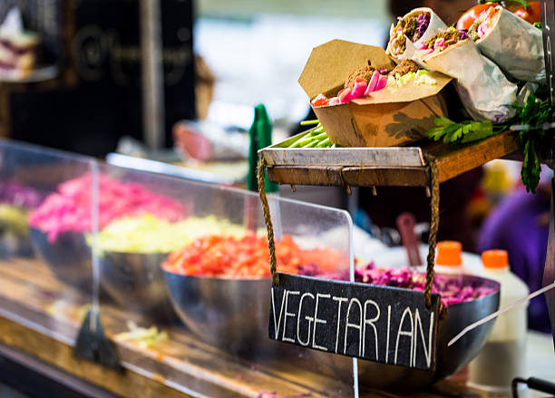 vegetarian food stall at borough market, london, uk - english tomato imagens e fotografias de stock