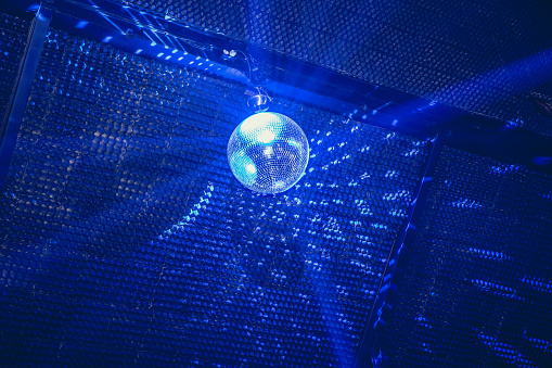 Disco ball in blue lights