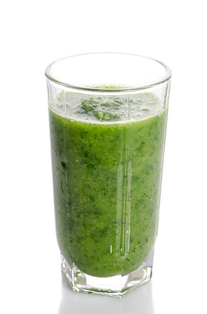 istock Green smoothie  as healthy summer drink isolated on white 620730572