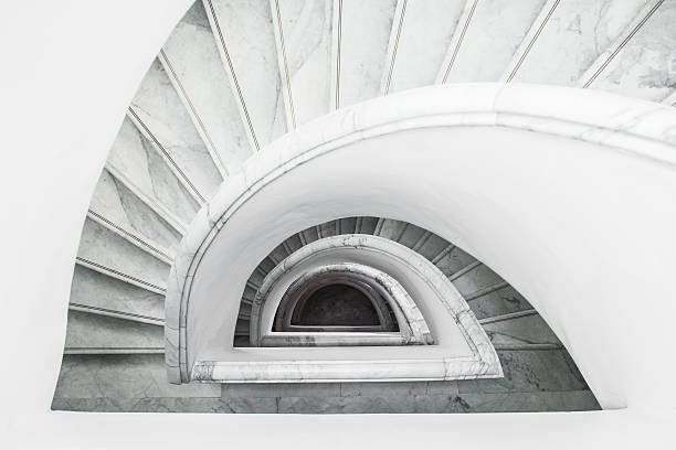 white grey spiral staircase with railing, top view - personal perspective vanishing point diminishing perspective staircase imagens e fotografias de stock