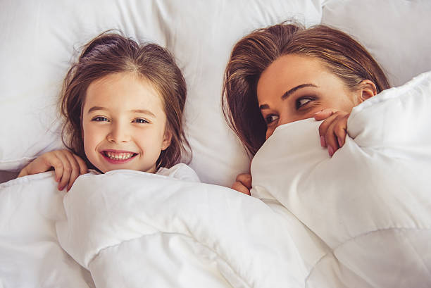 istock Mother and daughter at home 620734490