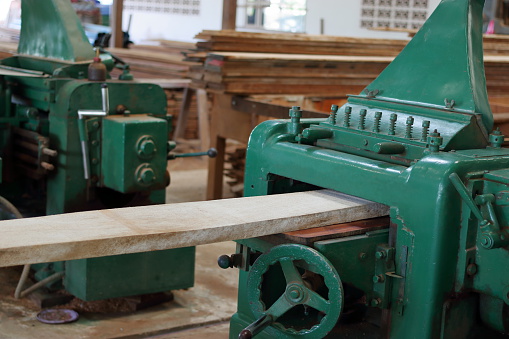 Planing of wood machine in workshop