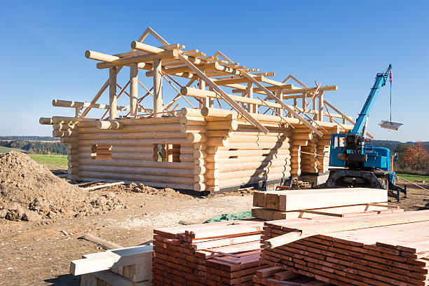 Wooden timber, construction site, construction of  wooden house, building a wooden house, crane at construction site, unfinished wooden house