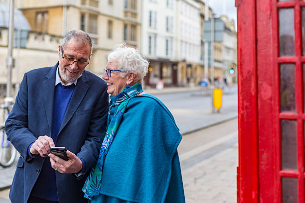 istock Active Senior Couple Using a Mobile Phone in England 620741864