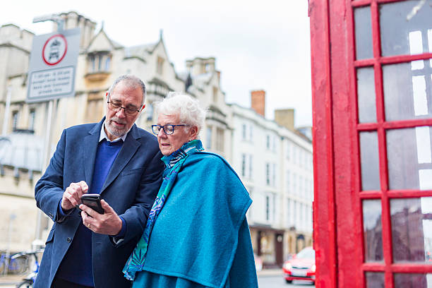 istock Active Senior Couple Using a Mobile Phone in England 620741980