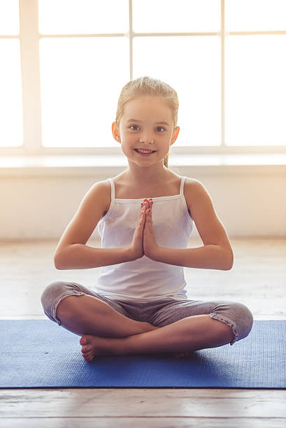 istock Little girl doing sport 620742196