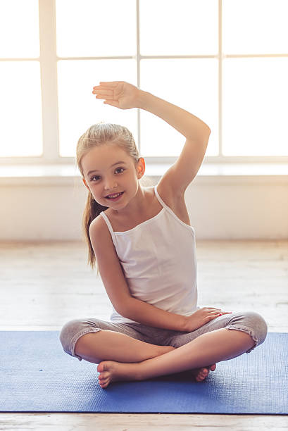 istock Little girl doing sport 620742246