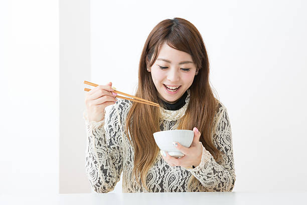 istock Japanese woman with bowl 620742300